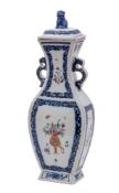 A Chinese famille rose vase and cover of flattened baluster form with lion dog finial and mythical