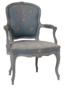 A carved and painted wood fauteuil de salon in Louis XV taste, early 20th century, the shaped back,