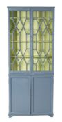 A painted wood and glazed cabinet bookcase in George III taste,
