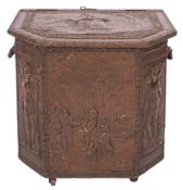 A Continental repousse copper and wood coal scuttle, probably northern French,