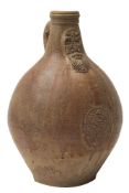 A stoneware Bartmann krug or Bellarmine jug,