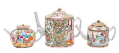 A group of three Canton teapots and covers,