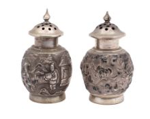 A pair of Chinese silver pepperettes by Luen Wo,