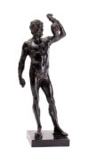 A Continental black patinated bronze model of a deity or mythological figure, possibly Mars,
