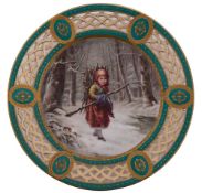 A Minton porcelain cabinet plate, with pierced rim containing oval panels,