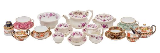 A miniature Royal Crown Derby porcelain tea service, comprising a teapot and cover, milk jug,