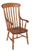 An elm and beech lathe back elbow chair,