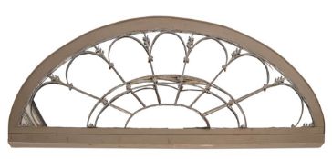 A Regency, reputedly Irish painted wood and metal fanlight overdoor, adapted as a wall mirror,