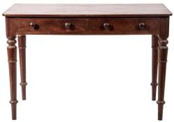 A Victorian mahogany side table, mid 19th century; the rectangular top with rounded front corners,