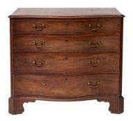 A George III mahogany serpentine front chest of drawers,
