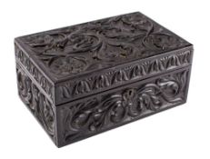 A Sri Lankan carved ebony and bone inset casket, 19th century, of hinged rectangular form,
