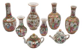 A pair of small Canton bottle vases together with three similar vases and two miniature teapots and