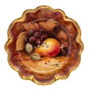 A Coalport porcelain cabinet plate, of silver shape painted with grapes,