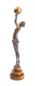 A painted resin figure of a young woman in Art Deco taste,