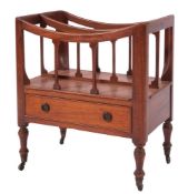A late George III mahogany Canterbury, circa 1800; with concave top above the front,
