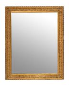 A gilt composition framed rectangular wall mirror,