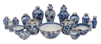 A mixed lot of Chinese blue and white small vases, jarlets and bowls variously painted with flowers,