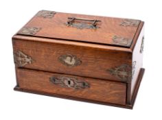 A late Victorian oak and brass mounted humidor, circa 1900,