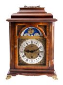 A modern chiming moonphase bracket clock the eight-day duration movement having a floating balance
