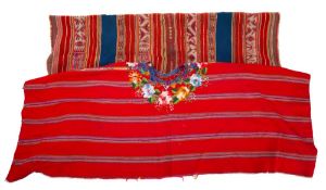 WITHDRAWN A South or Central American woven and embroidered poncho, mid-20th century,