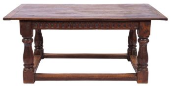An oak dining table in 17th century style,
