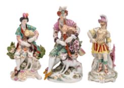 A group of three Derby figures comprising two figures of shepherds each playing the bagpipes with a