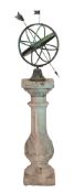 A verdigris patinated and carved stone mounted armillary sphere,