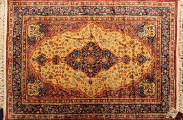 A Shiraz Rug the indigo field with a central rose stepped lozenge medallion,