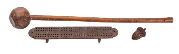 A Knobkerrie with circular pommel with chamfered sides, mounted on a slender tapering shaft,