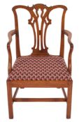 A George III mahogany elbow chair in Chippendale style,