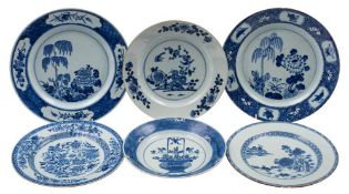 A group of six Chinese blue and white plates variously painted with a jardiniere of flowers, willow,
