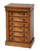 A Victorian walnut table top Wellington chest,