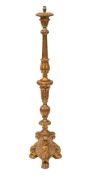 A Continental carved and giltwood standard lamp in early 18th century taste,