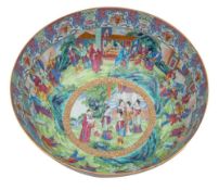 A large Canton punch bowl richly enamelled overall with elaborate Court scenes within bands of