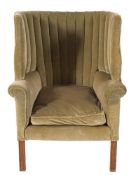 A George III upholstered barrel back armchair,