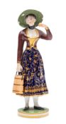 A Bloor Derby figure of a milk maid wearing a brown jacket and gilt decorated blue skirt,