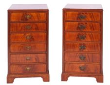 A pair of mahogany chests of drawers in George III taste,