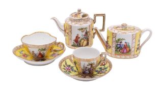 A small group of Dresden porcelain, comprising two small tea pots,