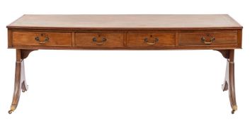 An early 20th century mahogany and leather inset library table,