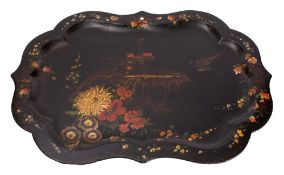 A Victorian painted papier mache serving tray, third quarter 19th century, of cartouche form,