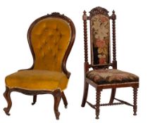 A Victorian carved walnut and button upholstered slipper back nursing chair,