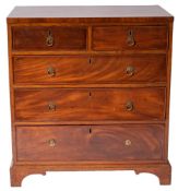 A George III mahogany chest of drawers,
