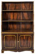 A Regency painted faux coromandel and parcel gilt waterfall bookcase,