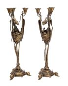 After Auguste-Nicolas Cain (French, 1821-1894), a pair of gilt bronze three-light candelabra,