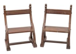 A pair of Victorian oak chairs in Gothic style,