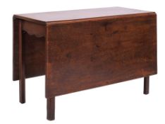 A George III mahogany drop leaf dining table,