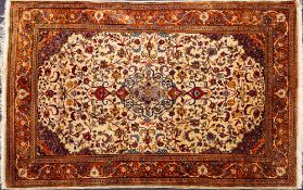 A Qum Part Silk Rug,