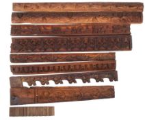 A quantity of wood architectural mouldings, late 19th/early 20th century, mostly oak,
