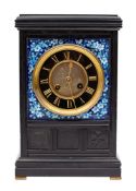 A French black slate mantel clock the eight-day duration movement striking the hours and half-hours