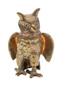 A Sri Lankan brass and glass-inset model of a long-eared owl, 20th century, modelled standing,